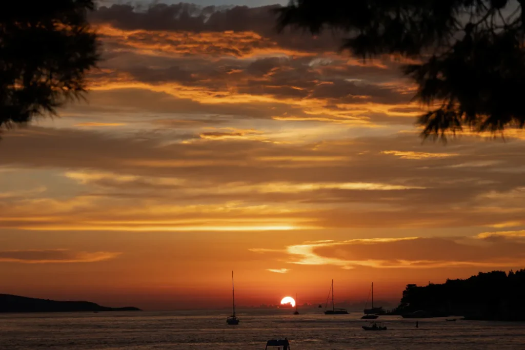 Hvar Town harbour at sunset