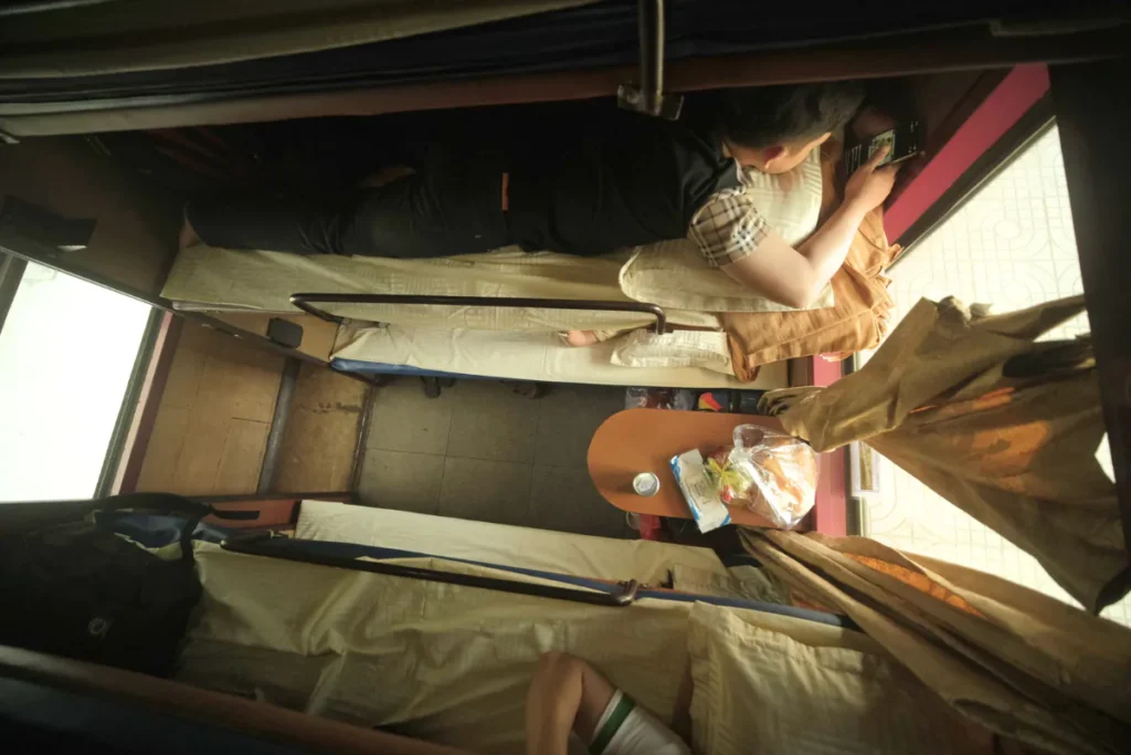 Sleeper train cabin with bunk beds, similar to a Caledonian Sleeper Classic Room